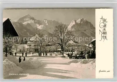 AK / Ansichtskarte Garmisch Partenkirchen Marktplatz im Winter Kat. Garmisch Partenkirchen