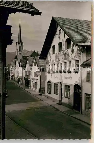 AK / Ansichtskarte Garmisch Partenkirchen Innenstadt Gasthof Kirche Kat. Garmisch Partenkirchen