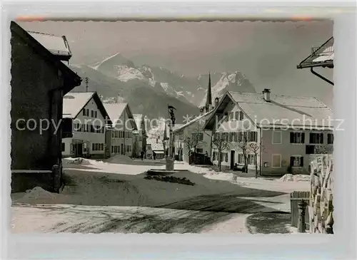 AK / Ansichtskarte Garmisch Partenkirchen 
Floriansbrunnen Winter Kat. Garmisch Partenkirchen