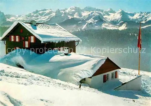 AK / Ansichtskarte Schwyz Ski und Ferienhaus des TV Oerlikon Lauenenberg Alpenpanorama im Winter Kat. Schwyz