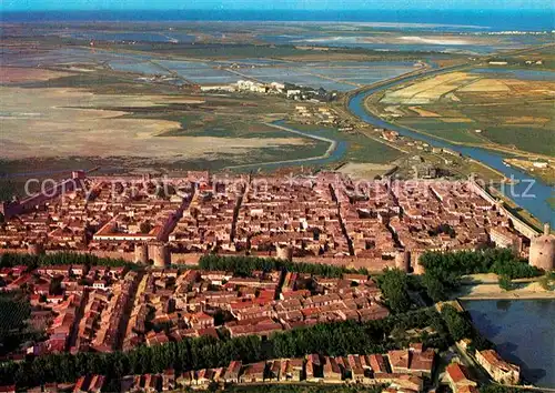 AK / Ansichtskarte Aigues Mortes Gard Vue generale aerienne sur la cite Kat. Aigues Mortes