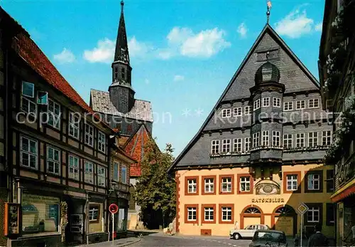 AK / Ansichtskarte Osterode Harz Rathaus und Marktkirche Fachwerkhaus Kat. Osterode am Harz