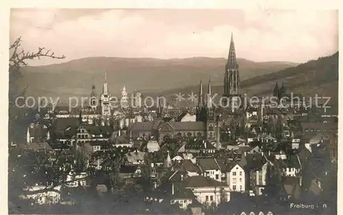 AK / Ansichtskarte Freiburg Breisgau Stadtblick mit Muenster Kat. Freiburg im Breisgau