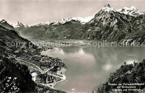 AK / Ansichtskarte Flueelen UR Panorama Vierwaldstaettersee mit Bristenstock Gitschen und Urirotstock Urner Alpen Kat. Flueelen