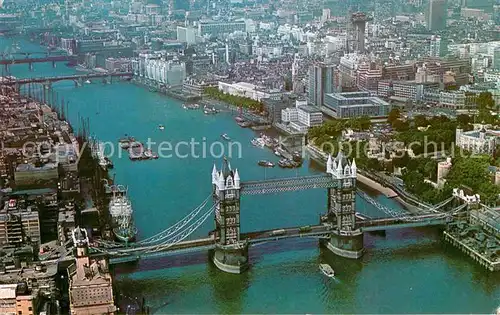 AK / Ansichtskarte London Aerial view of Tower Bridge and the City Kat. City of London