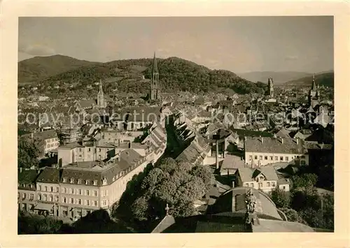 AK / Ansichtskarte Freiburg Breisgau Teilansicht mit Muenster Kat. Freiburg im Breisgau