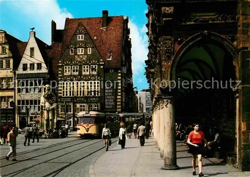AK / Ansichtskarte Bremen Markt mit Rathausarkaden und Roland Statue Strassenbahn Kat. Bremen