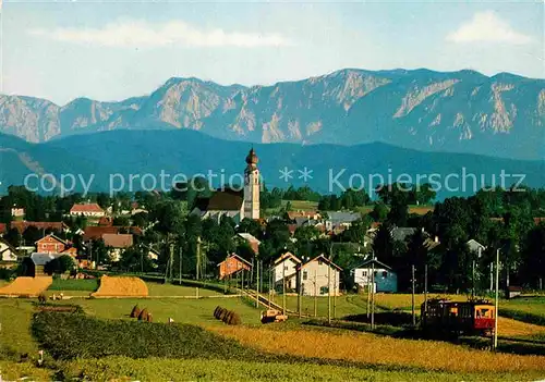 AK / Ansichtskarte St Georgen Attergau Ortsansicht mit Kirche Blick zum Hoellengebirge Kat. Voecklabruck