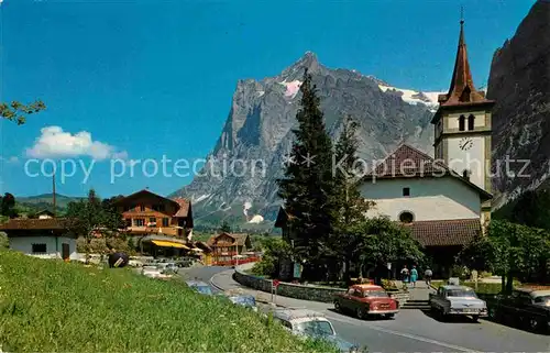 AK / Ansichtskarte Grindelwald Hauptstrasse Kirche Wetterhorn Berner Alpen Kat. Grindelwald