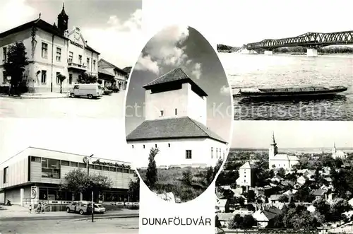 AK / Ansichtskarte Dunafoeldvar Hotel Gebaeude Turm Ortsansicht mit Kirche Donau Bruecke