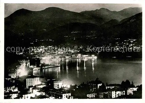 AK / Ansichtskarte Lugano Lago di Lugano di notte Nachtaufnahme