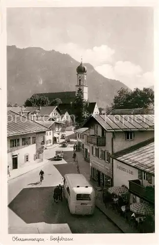 AK / Ansichtskarte Oberammergau Dorfstrasse Kirche Alpen Kat. Oberammergau