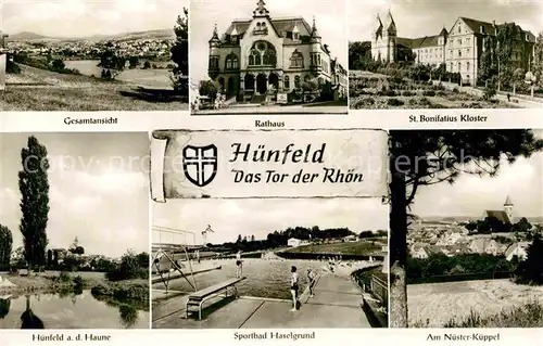 AK / Ansichtskarte Huenfeld Gesamtansicht Rathaus St Bonifatius Kloster Nuester Kueppel Sportbad Naselgrund Fluss Haune Kat. Huenfeld
