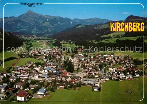 AK / Ansichtskarte Kirchberg Tirol Kitzbueheler Horn Alpenpanorama Fliegeraufnahme Kat. Kirchberg in Tirol