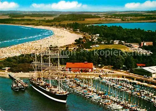 AK / Ansichtskarte Travemuende Ostseebad Strand Hafen Segelschiff Viermaster Fliegeraufnahme Kat. Luebeck