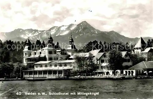 AK / Ansichtskarte Velden Woerther See Schlosshotel mit Mittagskogel Kat. Velden am Woerther See