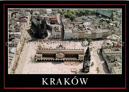 AK / Ansichtskarte Krakow Malopolskie Rynek Glowny Sukiennicami Wieza Ratuszowa kosciol Mariackim Kat. Krakow