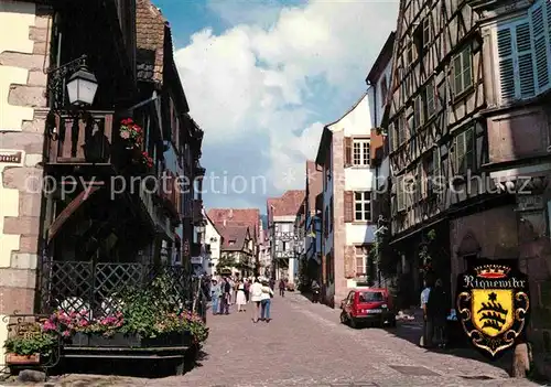 AK / Ansichtskarte Riquewihr Haut Rhin Maison Jung Selig Gasse mit Fachwerkhaeusern Kat. Riquewihr