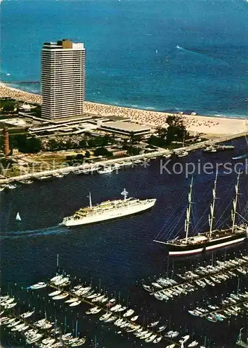 AK / Ansichtskarte Travemuende Ostseebad Hafen Segelschulschiff Passat Hotel Fliegeraufnahme Kat. Luebeck