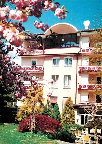 AK / Ansichtskarte Poertschach Woerthersee Hotel Sonnengrund Baumbluete Kat. Poertschach Woerther See Kaernten