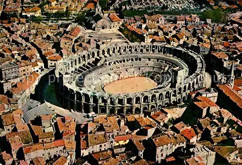 AK / Ansichtskarte Arles Bouches du Rhone Vue aerienne des arenes Kat. Arles