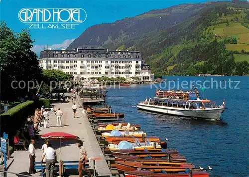 AK / Ansichtskarte Zell See Grand Hotel Promenade Bootsliegeplatz  Kat. Zell am See