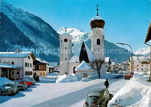 AK / Ansichtskarte St Anton Arlberg Kirchenpartie im Schnee Kat. St. Anton am Arlberg