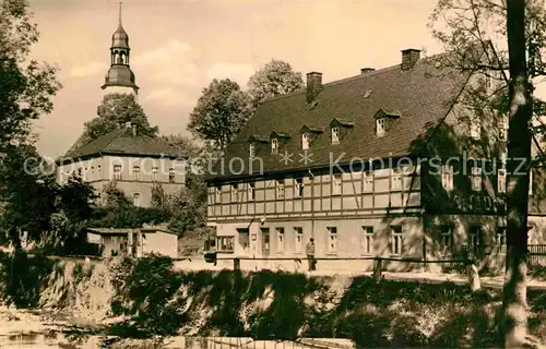 AK / Ansichtskarte Zwoenitz Ortspartie am Fluss Kirchturm Kat. Zwoenitz