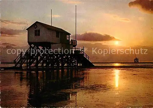 AK / Ansichtskarte St Peter Ording Strand bei Sonnenuntergang Kat. Sankt Peter Ording