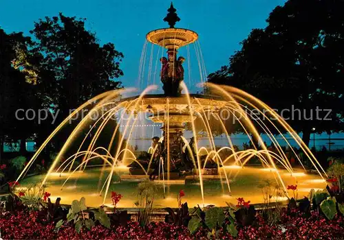 AK / Ansichtskarte Geneve GE Fontaine du Jardin Anglais de nuit Englischer Garten Springbrunnen Kat. Geneve