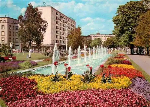 AK / Ansichtskarte Karlsruhe Baden Wasserspiele Blumenbeete