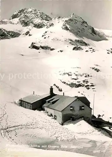 AK / Ansichtskarte Wiesbadener Huette Berghaus mit Piz Buin Winterpanorama Silvretta Kat. Partenen Montafon