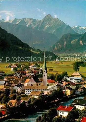 AK / Ansichtskarte Zell Ziller Tirol Ortsansicht mit Kirche mit Blick zum Tristner Zillertaler Alpen Kat. Zell am Ziller