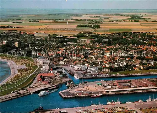 AK / Ansichtskarte Buesum Nordseebad Fliegeraufnahme Hafen Strand Kat. Buesum