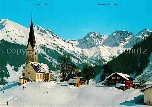 AK / Ansichtskarte Mittelberg Kleinwalsertal Kirche Winterlandschaft Kat. Oesterreich