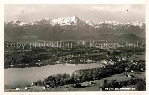 AK / Ansichtskarte Velden Woerther See mit Alpenpanorama Fliegeraufnahme Kat. Velden am Woerther See