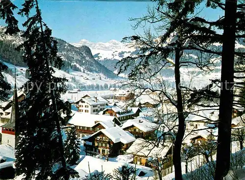 AK / Ansichtskarte Gstaad Winterpanorama Berner Oberland Alpenpanorama Kat. Gstaad