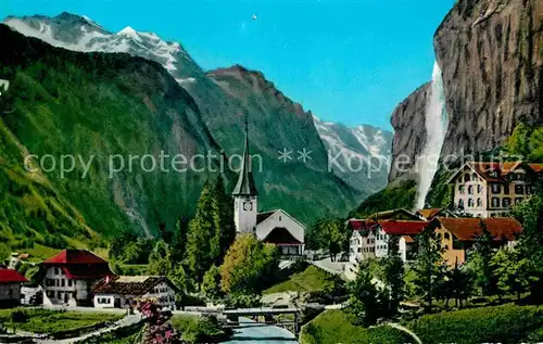 AK / Ansichtskarte Lauterbrunnen BE Ortsansicht mit Kirche Staubbach Wasserfall Jungfrau Berner Alpen Kat. Lauterbrunnen
