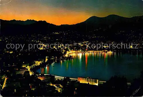 AK / Ansichtskarte Lugano TI Promenade bei Nacht Kat. Lugano