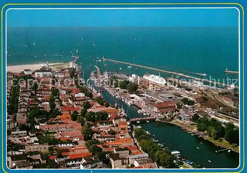 AK / Ansichtskarte Warnemuende Ostseebad Fliegeraufnahme mit Altem Strom und Hafen  Kat. Rostock
