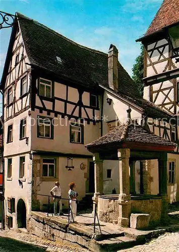 AK / Ansichtskarte Rothenburg Tauber Brunnen in der Hofbronnengasse Fachwerkhaus Kat. Rothenburg ob der Tauber