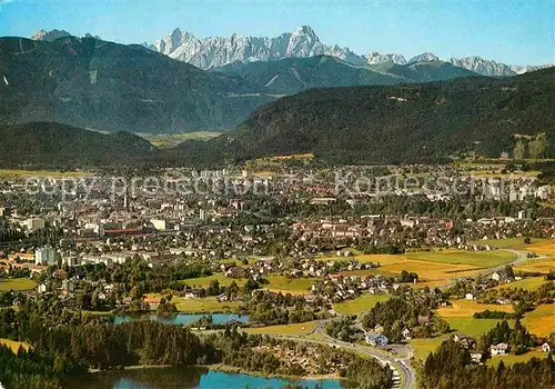 AK / Ansichtskarte Villach Kaernten mit Julischen Alpen im Vordergrund Vassachersee St Leonhard See Fliegeraufnahme Kat. Villach