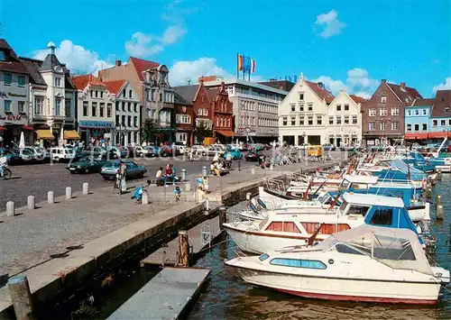 AK / Ansichtskarte Husum Nordfriesland Schiffbruecke Motorboot Uferstrasse Kat. Husum