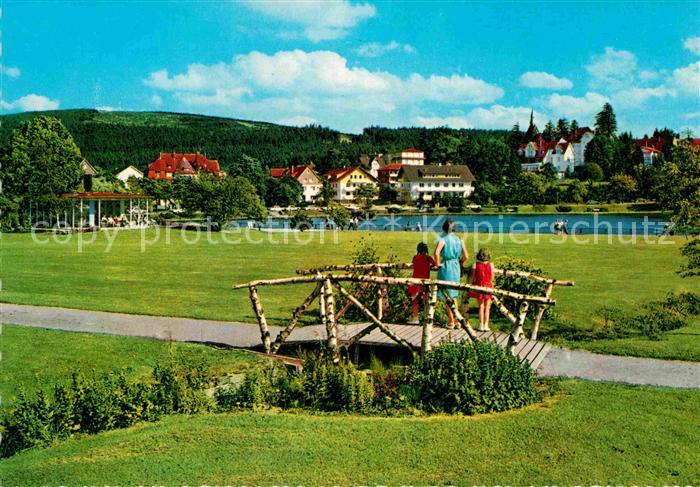 AK / Ansichtskarte Hahnenklee Bockswiese Harz Holzkirche Kurpark See