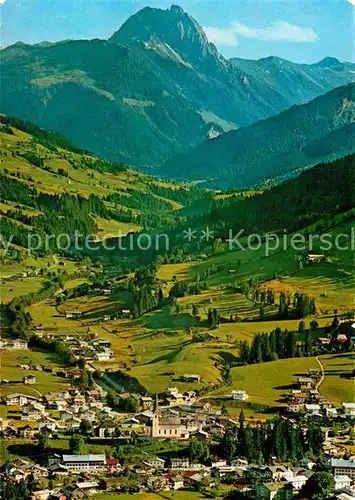 AK / Ansichtskarte Kirchberg Tirol Fliegeraufnahme mit grossem Rattenstein Kat. Kirchberg in Tirol