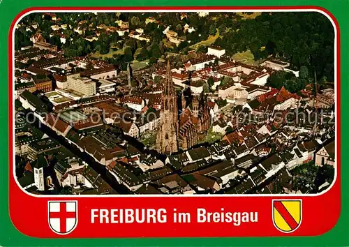 AK / Ansichtskarte Freiburg Breisgau Stadtzentrum mit Muenster Fliegeraufnahme Kat. Freiburg im Breisgau