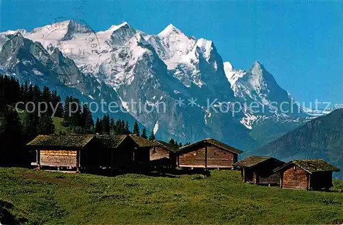 AK / Ansichtskarte Maegisalp Berghuetten mit Engelhoerner Wetterhorngruppe Moench Eiger Berner Alpen