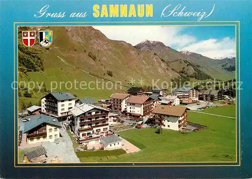 AK / Ansichtskarte Samnaun Dorf Dorfansicht mit Alpenpanorama Unterengadin Kat. Samnaun Dorf