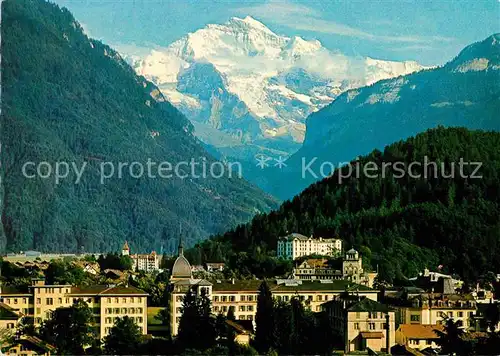 AK / Ansichtskarte Interlaken BE Stadtbild mit Jungfrau Berner Alpen Kat. Interlaken