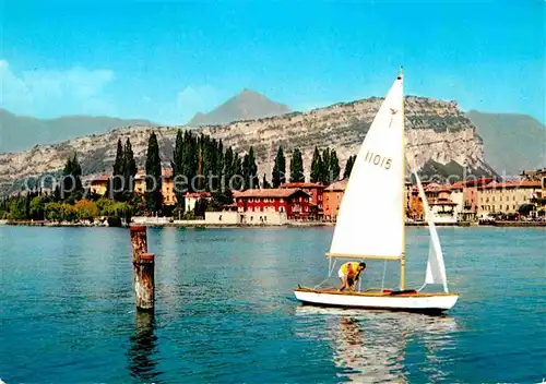 AK / Ansichtskarte Torbole Lago di Garda Ansicht vom Gardasee aus Segelboot Kat. Italien